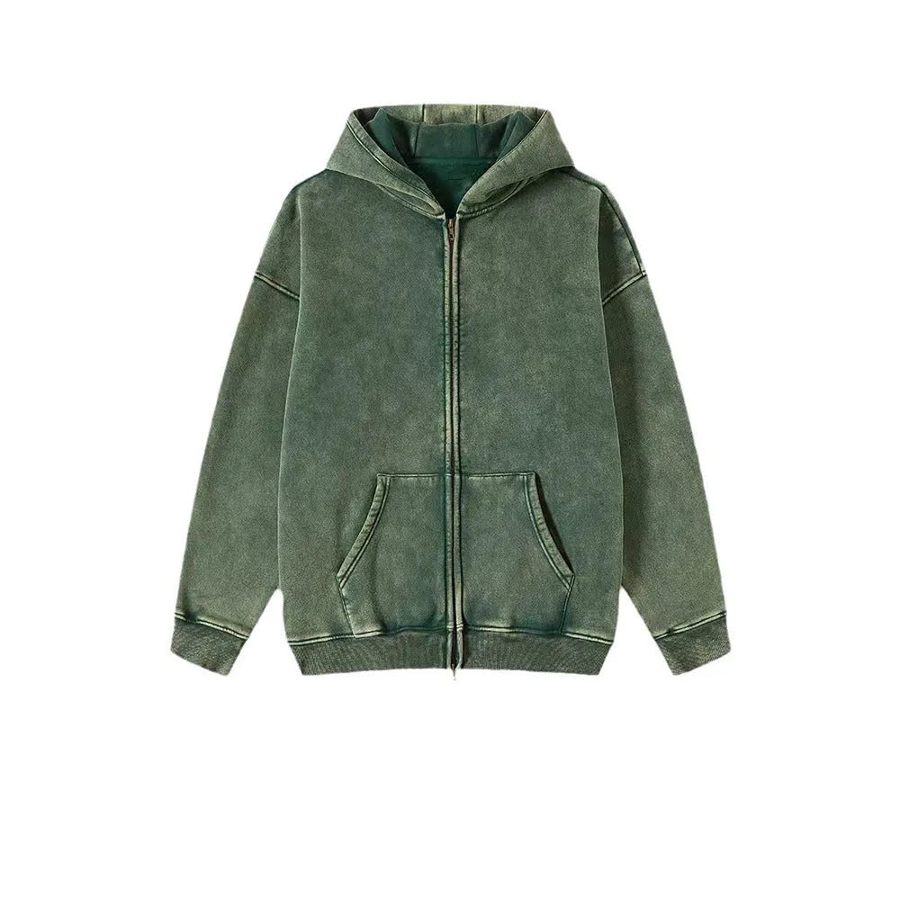 Man wearing a dark green hooded zip-up cardigan with a fleece lining and long sleeves.