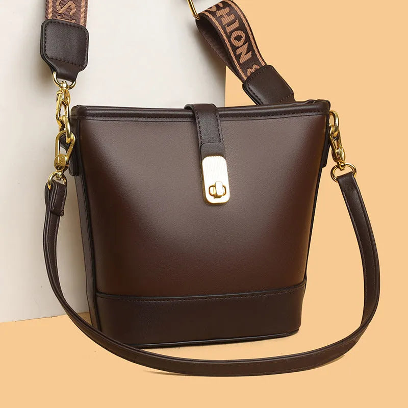 Korean style soft PU leather bucket bag with double shoulder straps in black colour showing internal organisation compartments