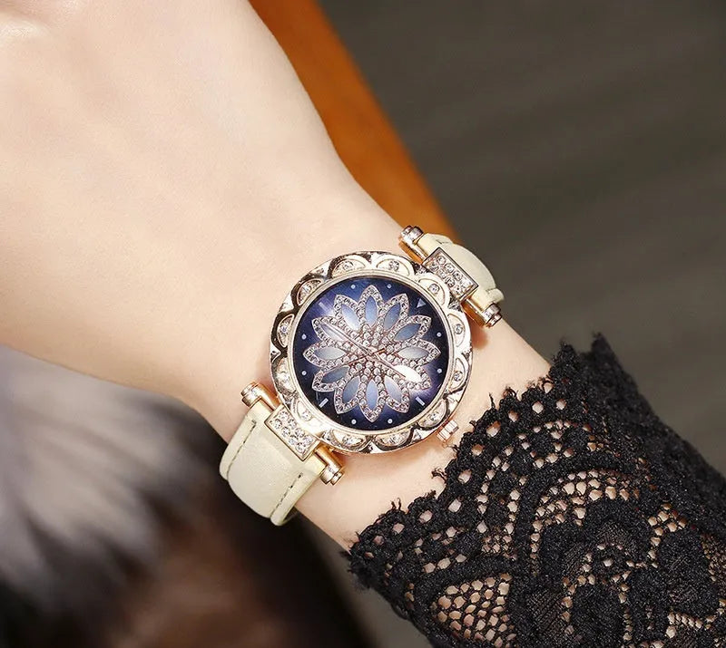 Round 32mm diamond dial ladies watch on wrist, showing pin buckle and available in multiple colours.
