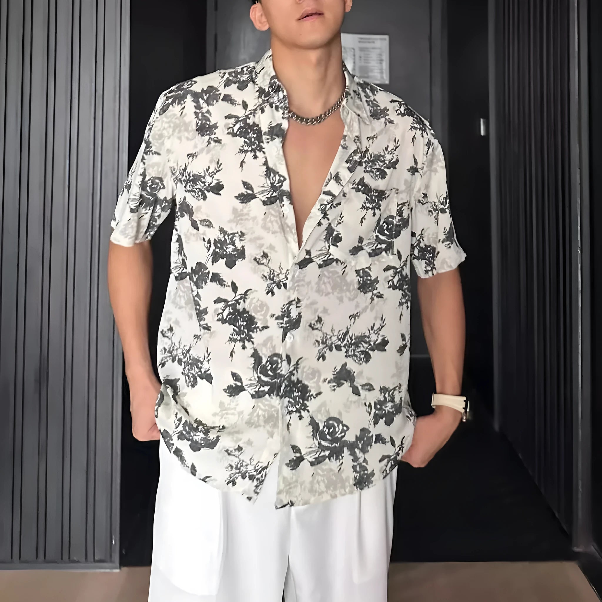 White floral printed casual shirt with short sleeves and loose cardigan-style fit