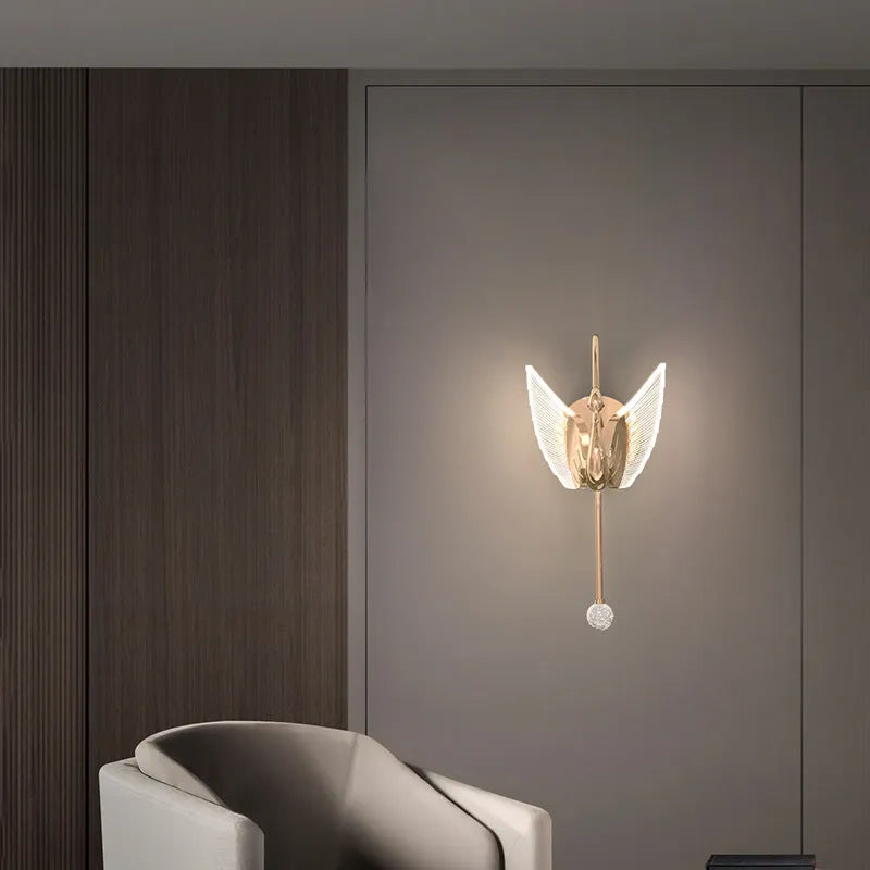 Modern gold swan-shaped wall lamp with acrylic shade and dimmable multi-colour LED lighting