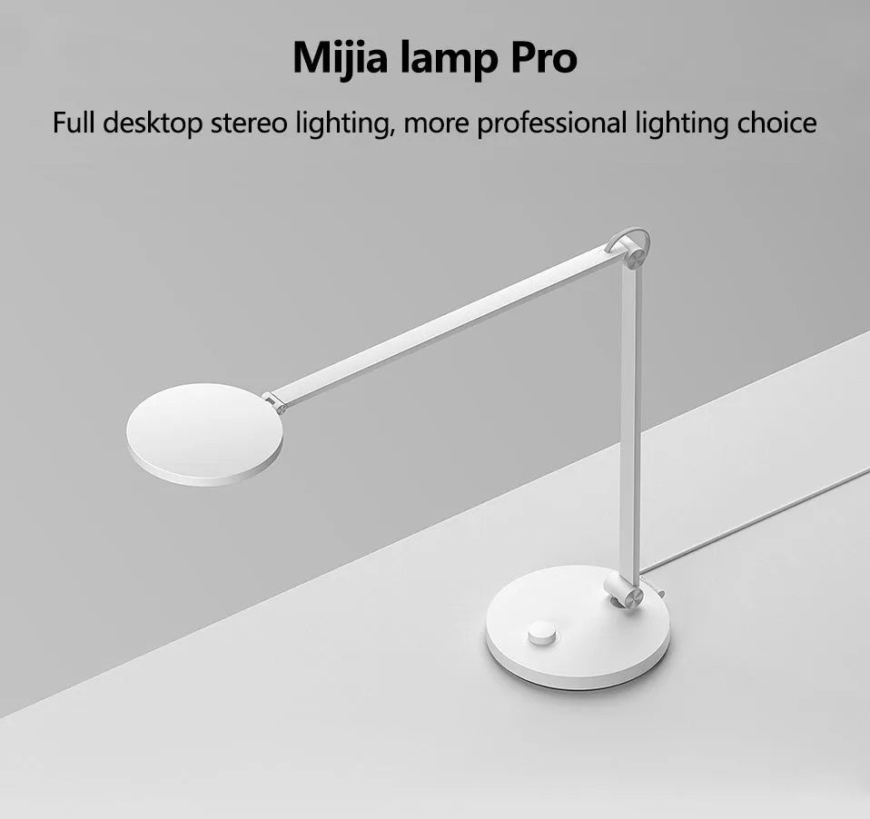 ProLED folding desk lamp with adjustable arm and modern design on a wooden desk.