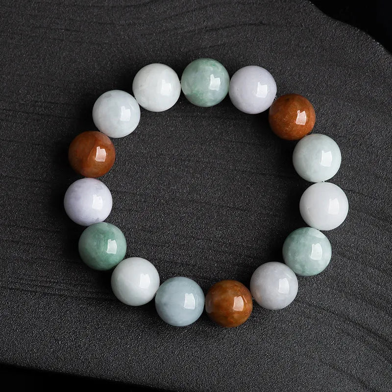 Natural Myanmar jade bracelet with three colours on 13mm round beads showing traditional craftsmanship