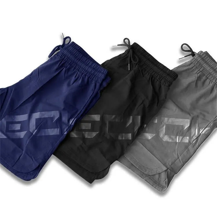 Men's black quick-dry running shorts with elastic waist and knee-length design for summer sports