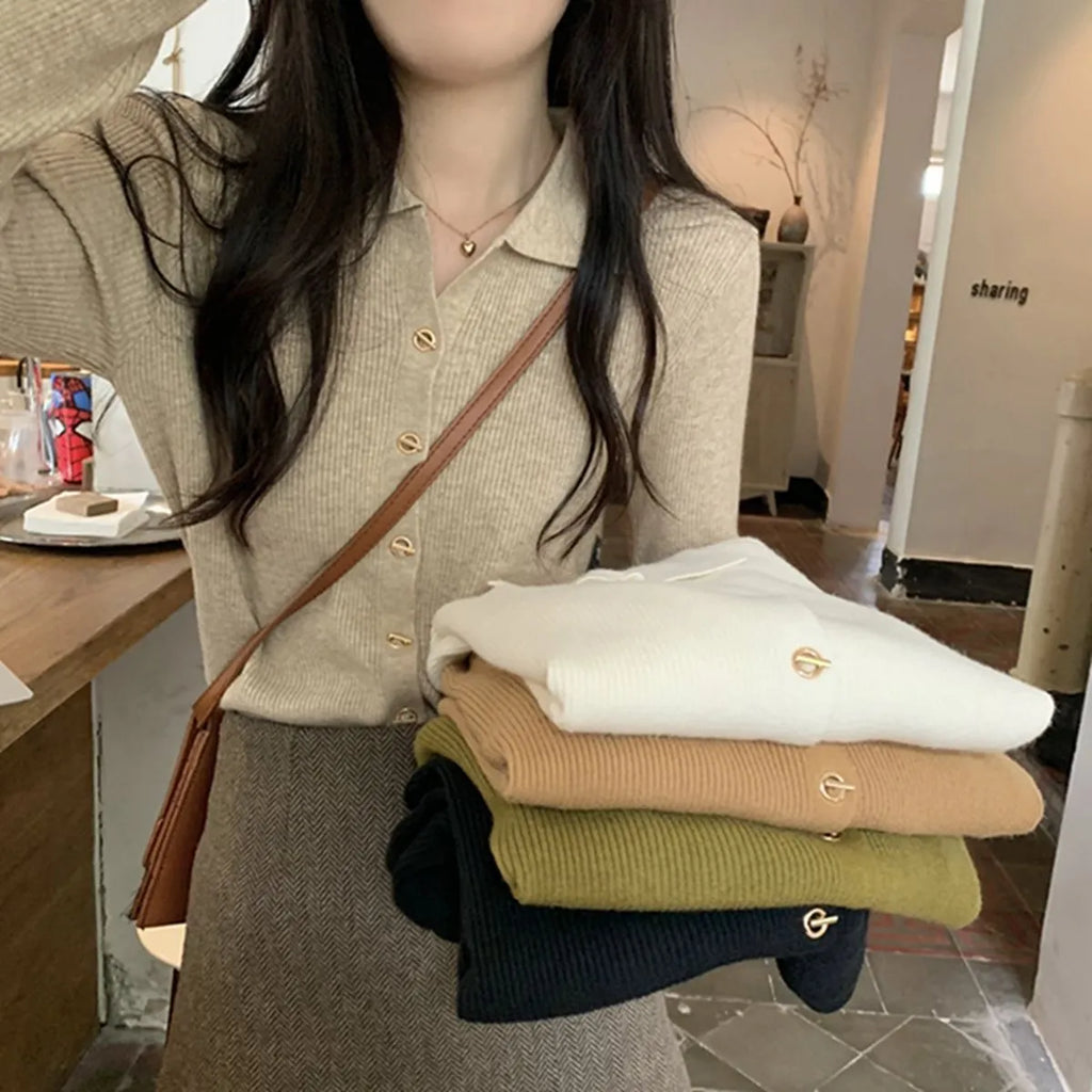 Long-sleeved oversized viscose cardigan in beige, black, oatmeal, green, or khaki, laid flat.