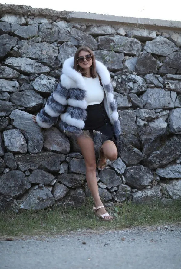 Women's artificial fur hooded coat in street fashion style showing brown and white silver fox colour options