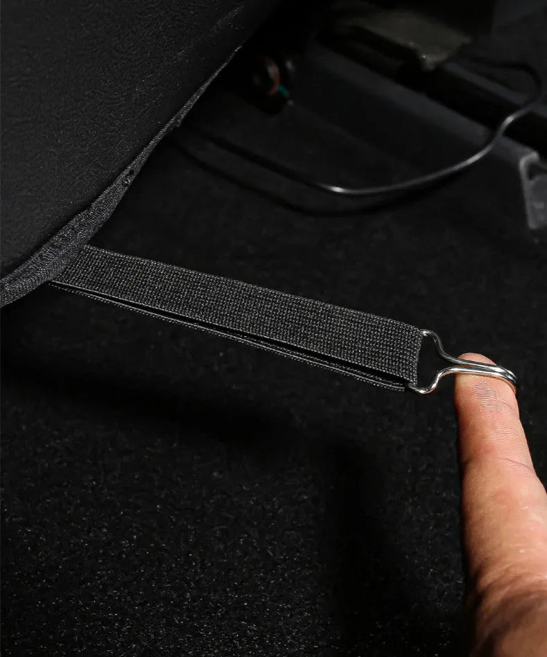 Pair of black leather anti kick pads for car seat backs, showing full coverage and single pocket.