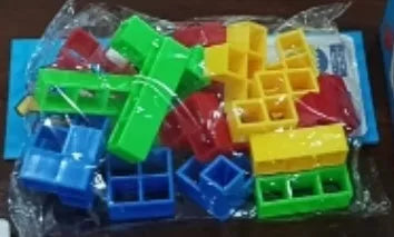 Plastic balance stacking board game with 16 colourful blocks on chassis and base
