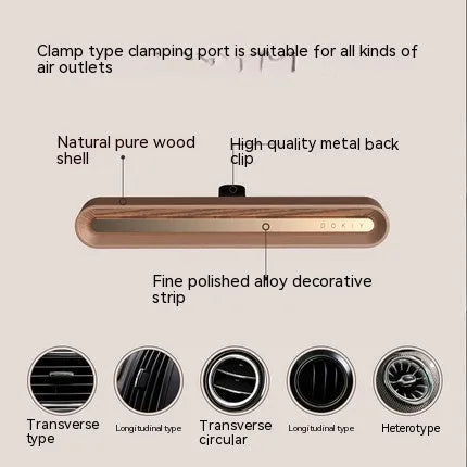 Long strip car aromatherapy ornament in walnut colour, shown clipped to a car air vent.