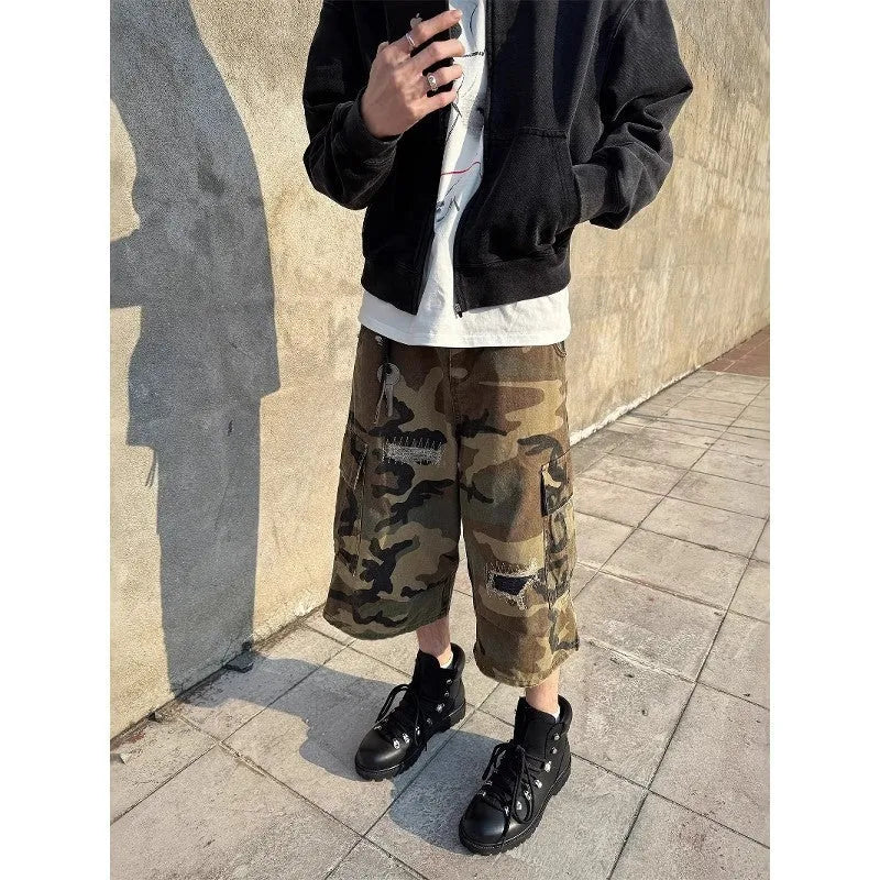 Men's camouflage cropped jeans with ripped detailing and loose straight leg fit