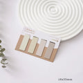 Set of four Morandi colour block magnetic bookmarks showing magnet fastening mechanism