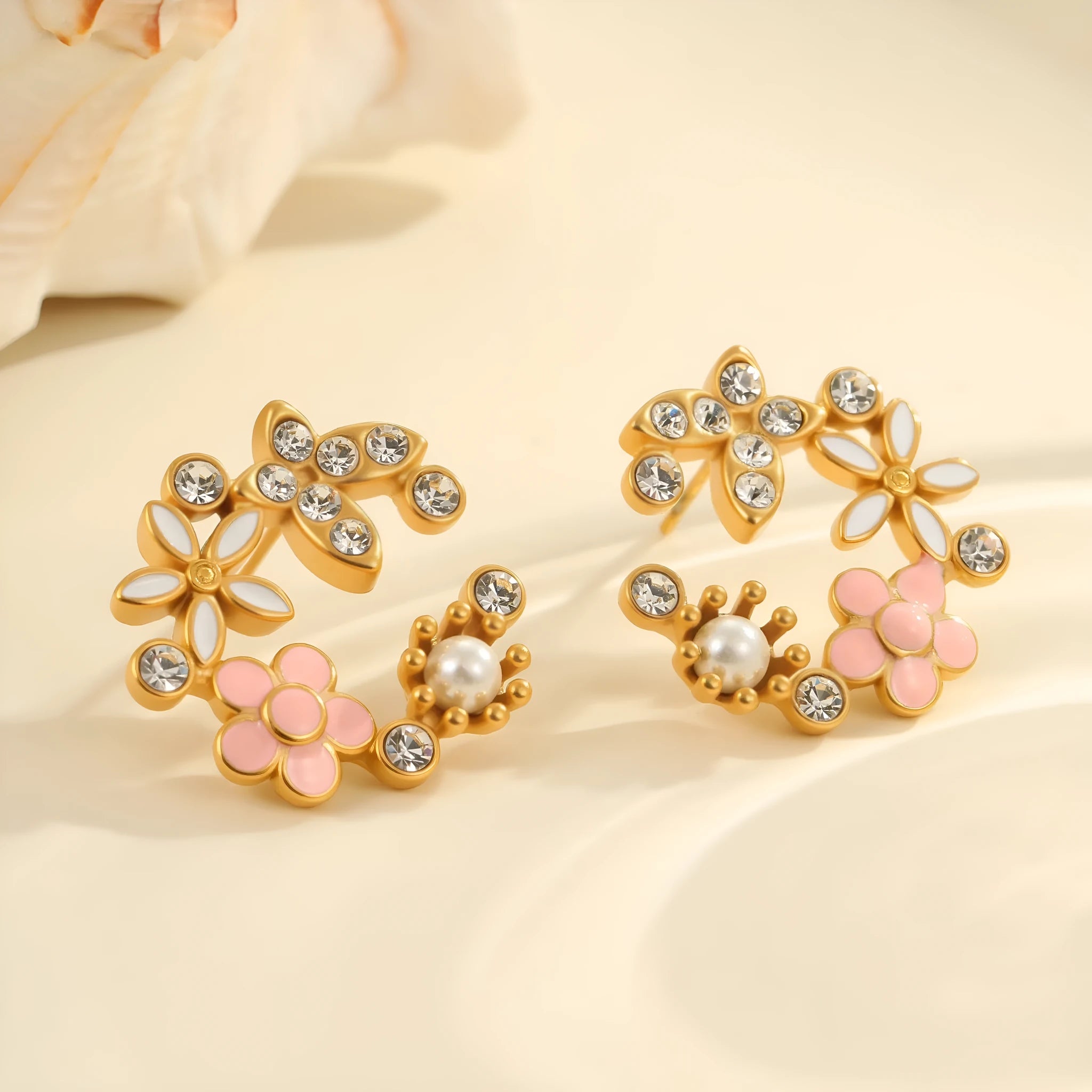 Flower stud earrings with petal design in 18K gold electroplated finish on stainless steel
