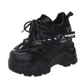 Women's white breathable mesh platform sports shoes with a cross strap and rubber sole.