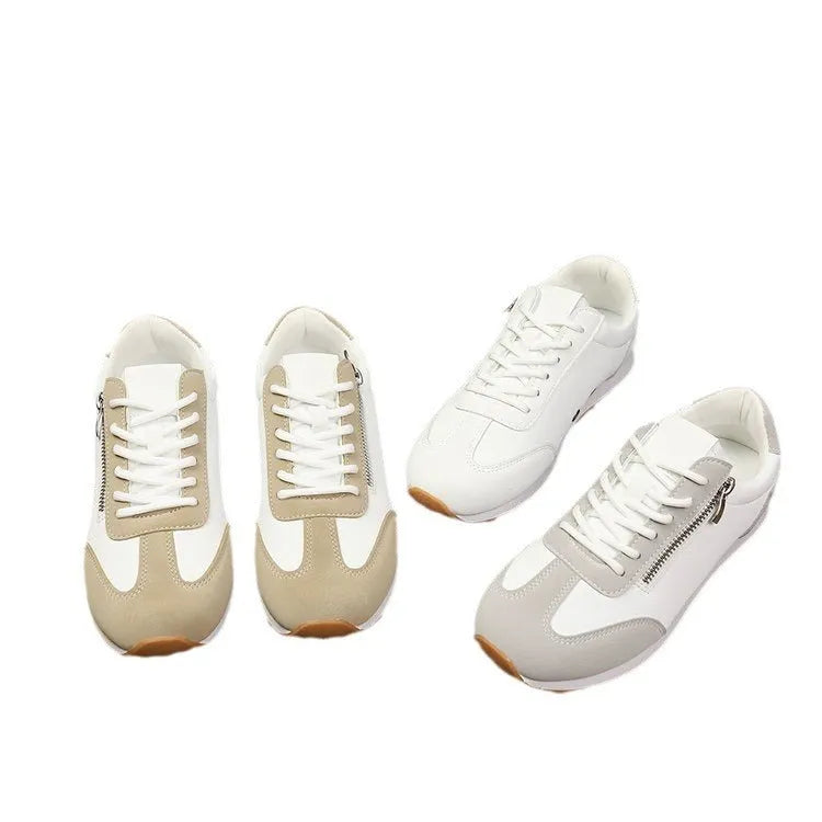 Women's flat-heeled shoes in champagne colour with artificial PU upper and rubber sole.