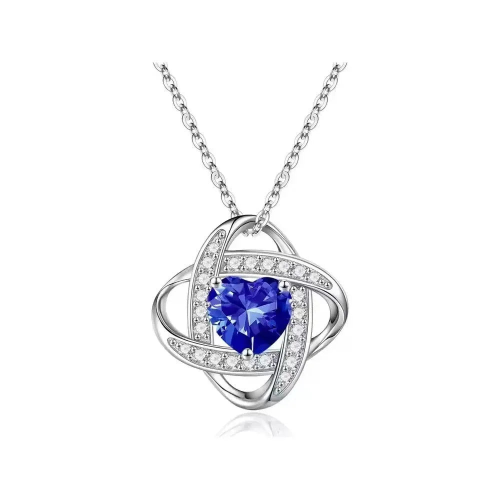 Copper heart necklace with electroplated platinum finish in five colour variations on model