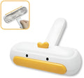 White portable pet hair remover with yellow duck design and polyester bristles for cleaning furniture