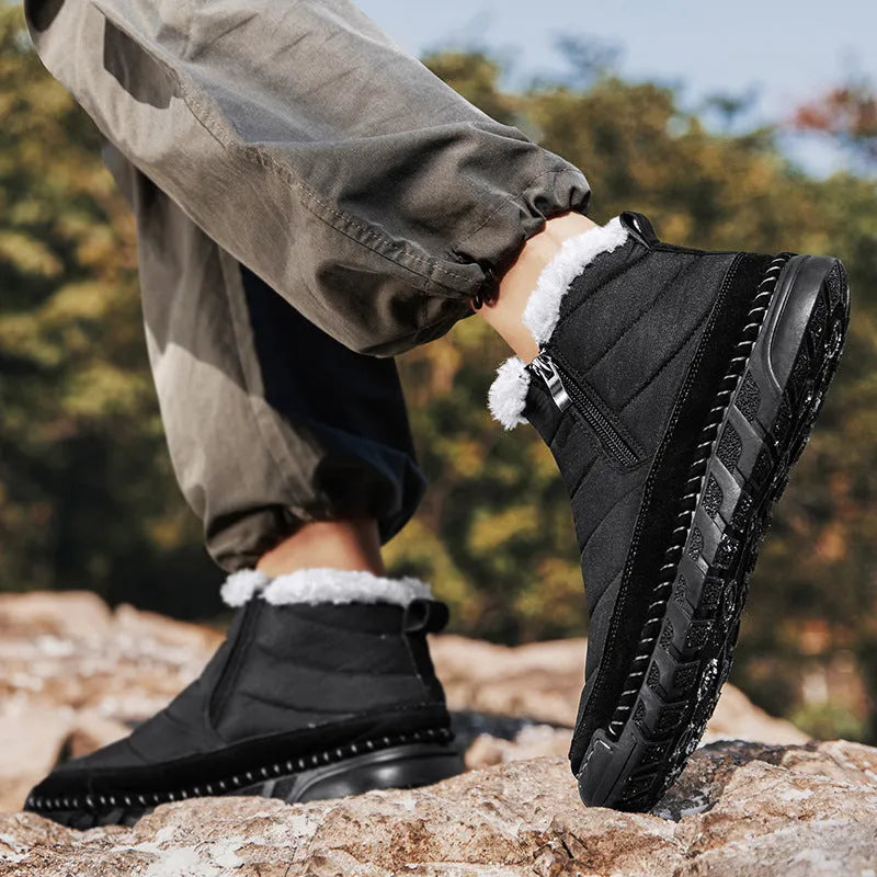 Men's green plus size snow boot with round toe, flat heel, and non-slip rubber sole.