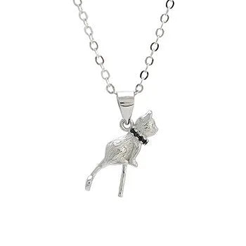 Close-up of a sterling silver cat pendant necklace on a clavicle chain.