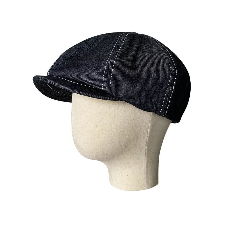 Black cotton retro beret with octagonal silhouette shown on model, unisex adult design
