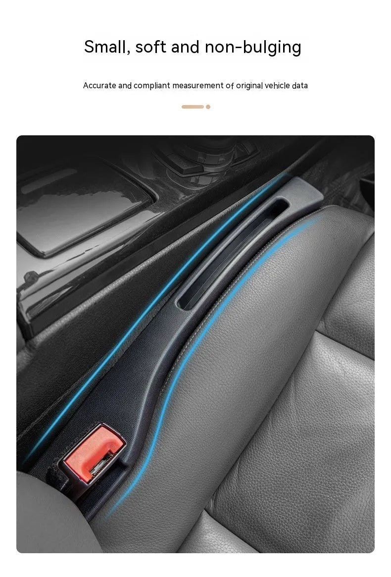 Black plastic car seat gap storage pocket with handle placed between vehicle seats.