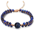 Handwoven geometric pull bracelet with blue tiger eye stone beads.