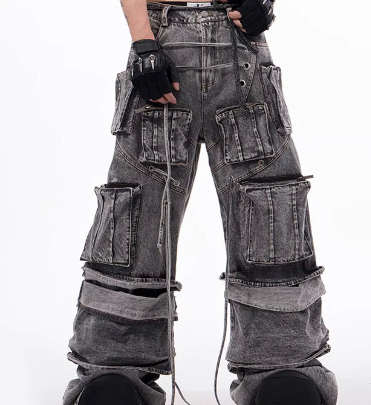 Grey distressed cotton denim men's overalls with rope stitching on the legs.