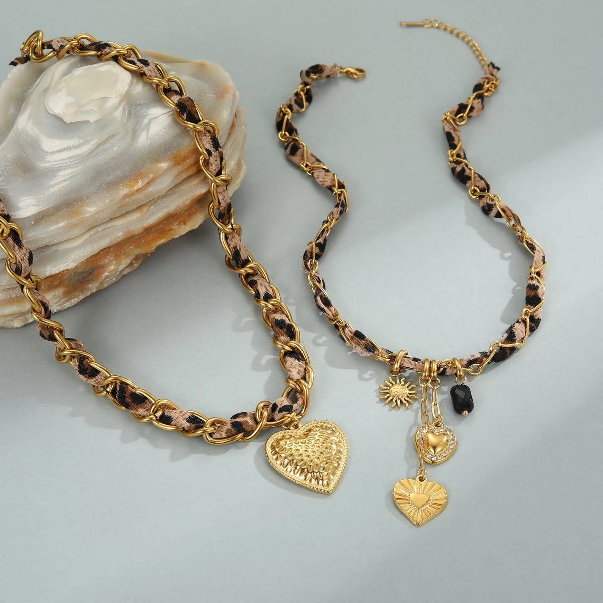 Women's stainless steel necklace with geometric leopard love pendant on adjustable chain
