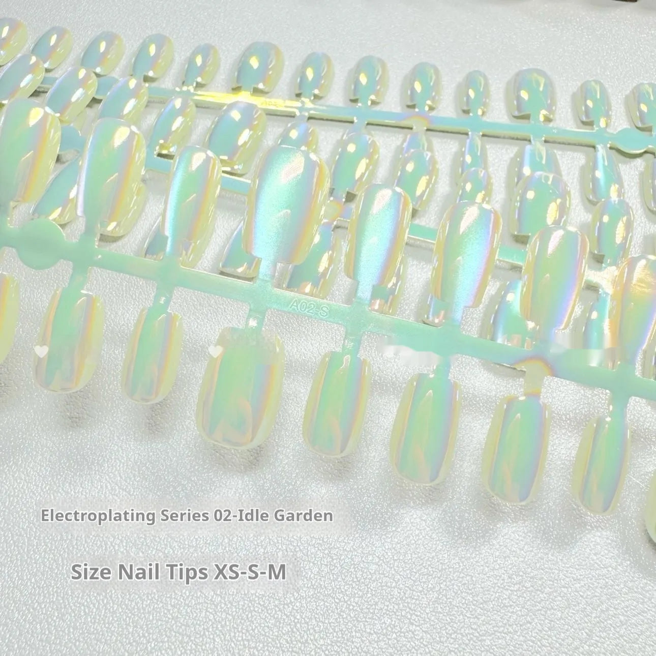 Electroplated Cat's Eye false nails with aurora finish in short ladder lengths XS S M