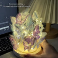 Butterfly night lamp with glass shade on raw wood base, showing 12x15cm size.