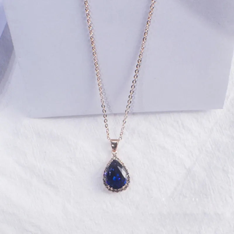 Drop shape women's necklace with rose gold electroplating and rhinestone geometric design in pink colour