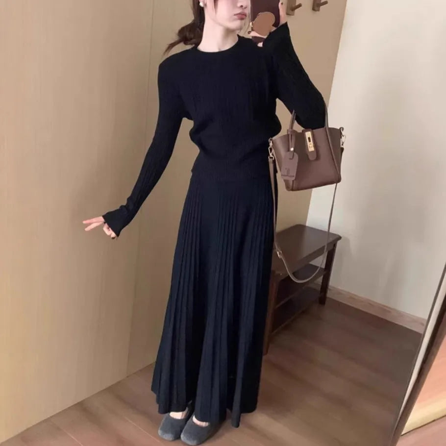Dark grey knitted long dress suit set with sweater, skirt, and 3D ethnic pattern.