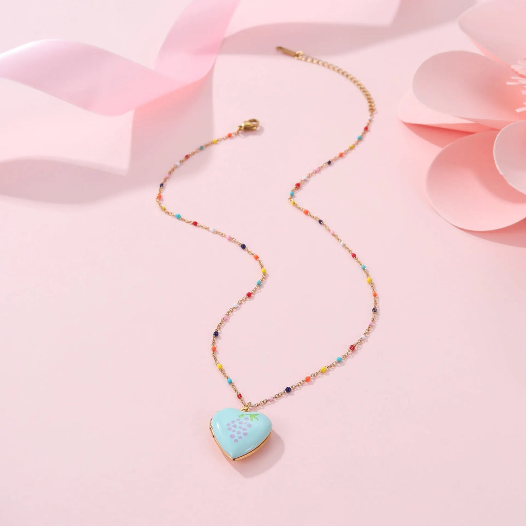 Gold-plated stainless steel necklace with heart-shaped fruit pendant on adjustable chain