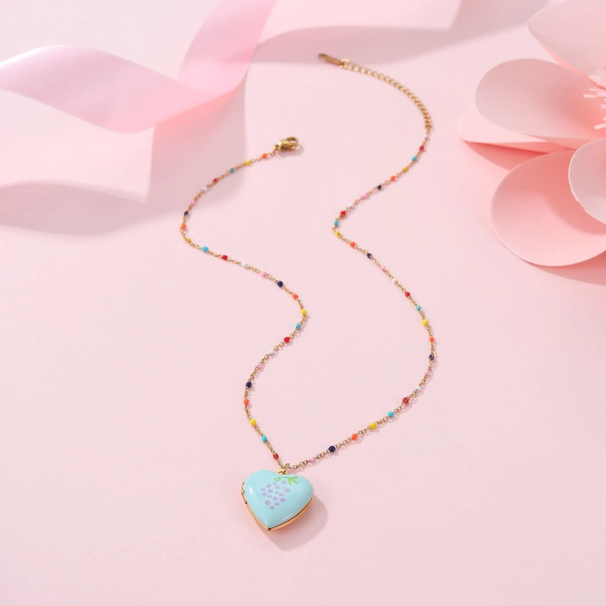 Gold-plated stainless steel necklace with heart-shaped fruit pendant on adjustable chain