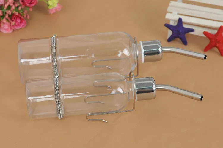 Hanging pet water feeder bottle with stainless steel faucet, transparent natural colour, 180ml or 350ml small animal drinking dispenser