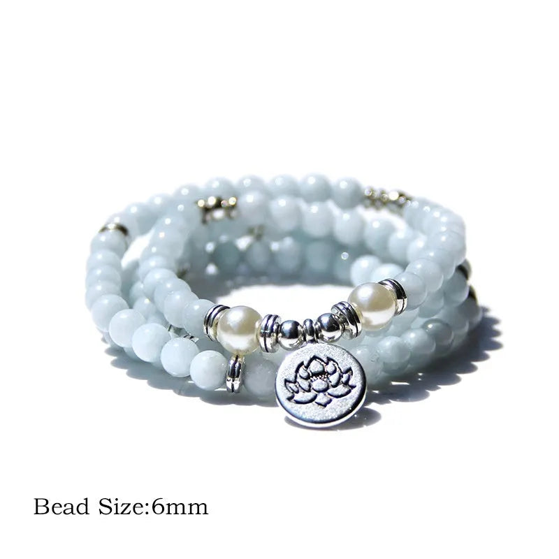 A women's vintage bracelet made of natural stone featuring a lotus geometry design.