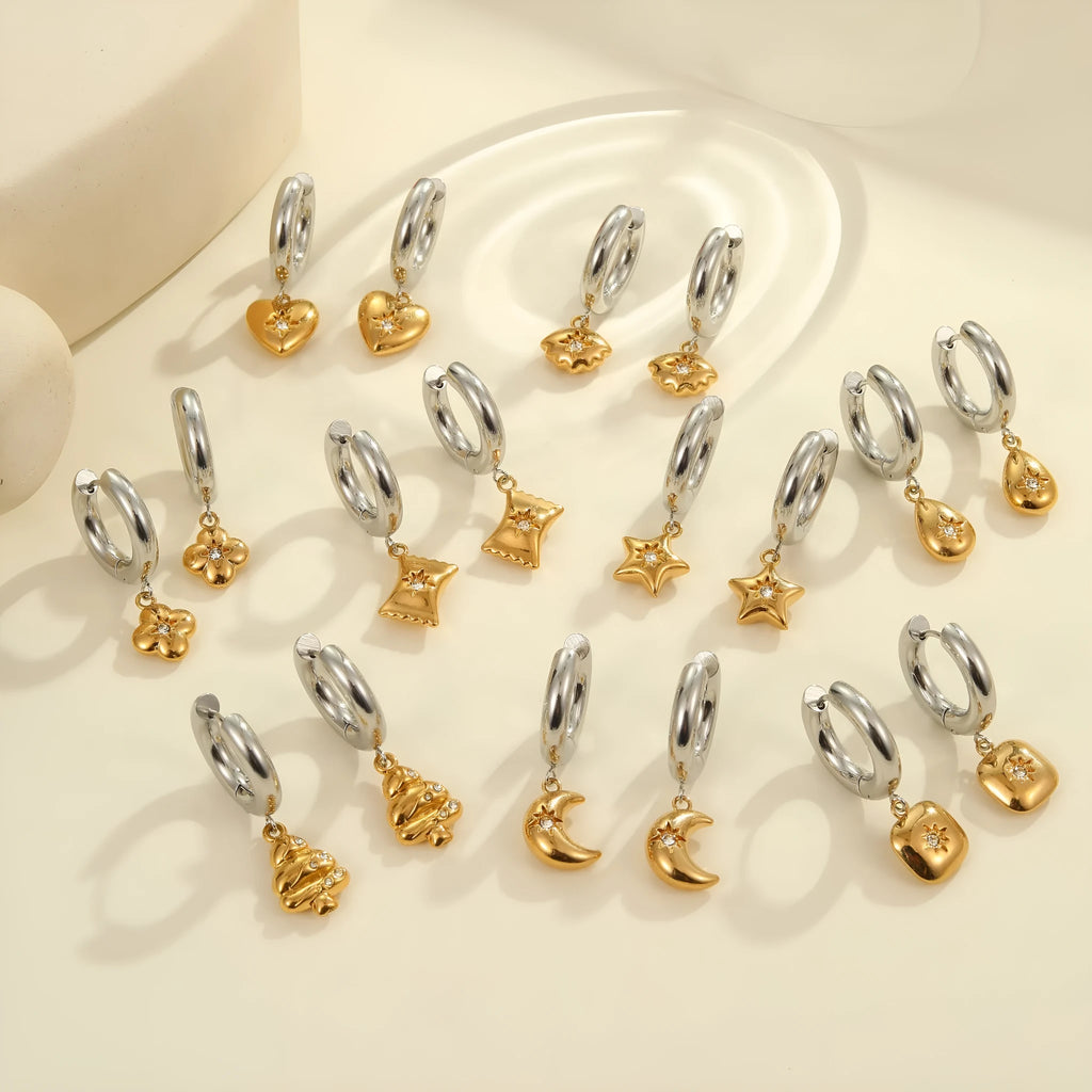 Christmas tree heart earrings in stainless steel with 18K gold plating showing heart and star shapes