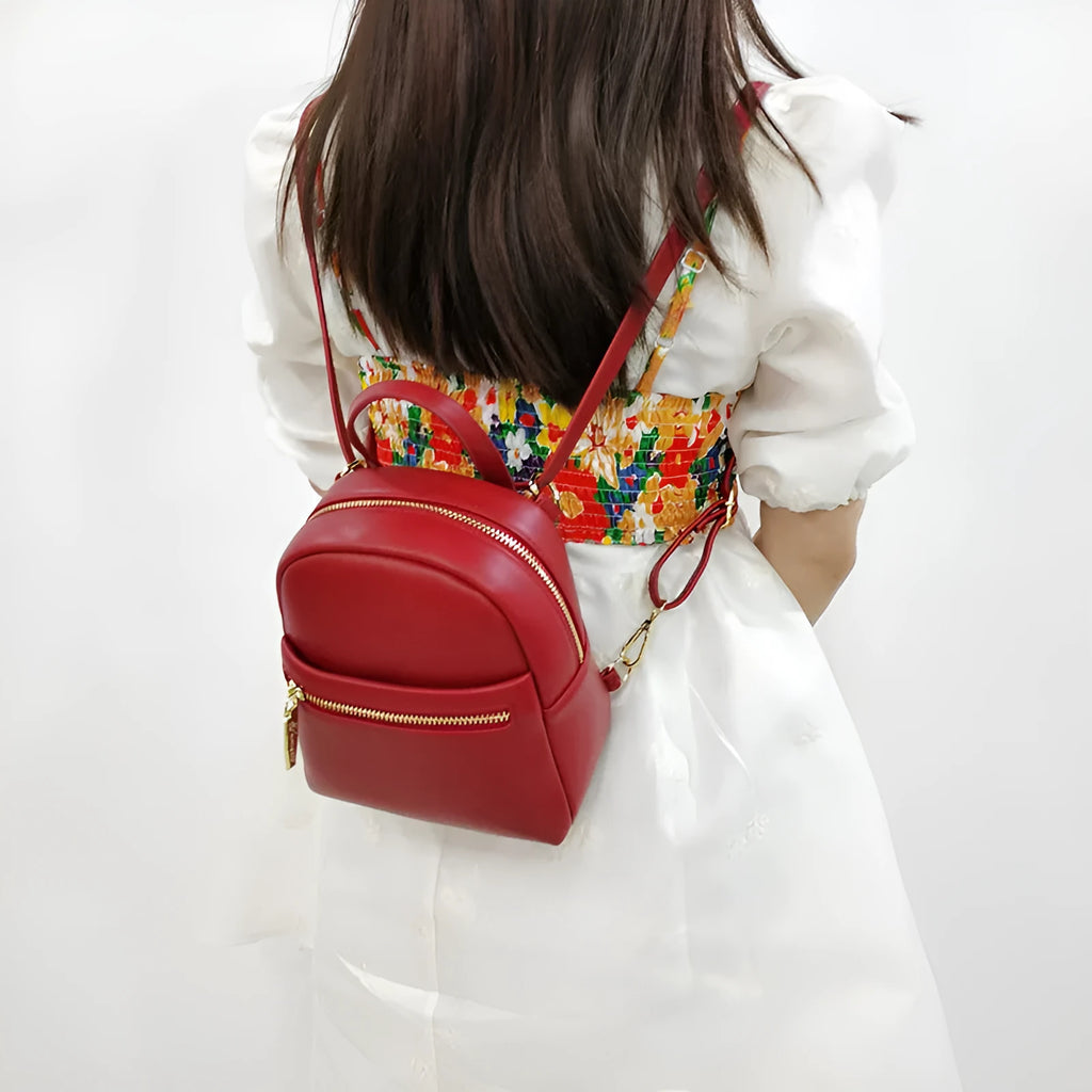 Soft PU mini backpack in street trend style with three-dimensional pocket and contrast colour details