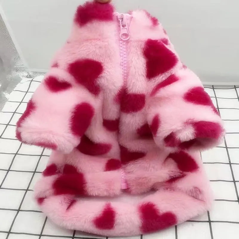 British style pink polyester warm coat on a small white dog, showing the fit and traditional design.