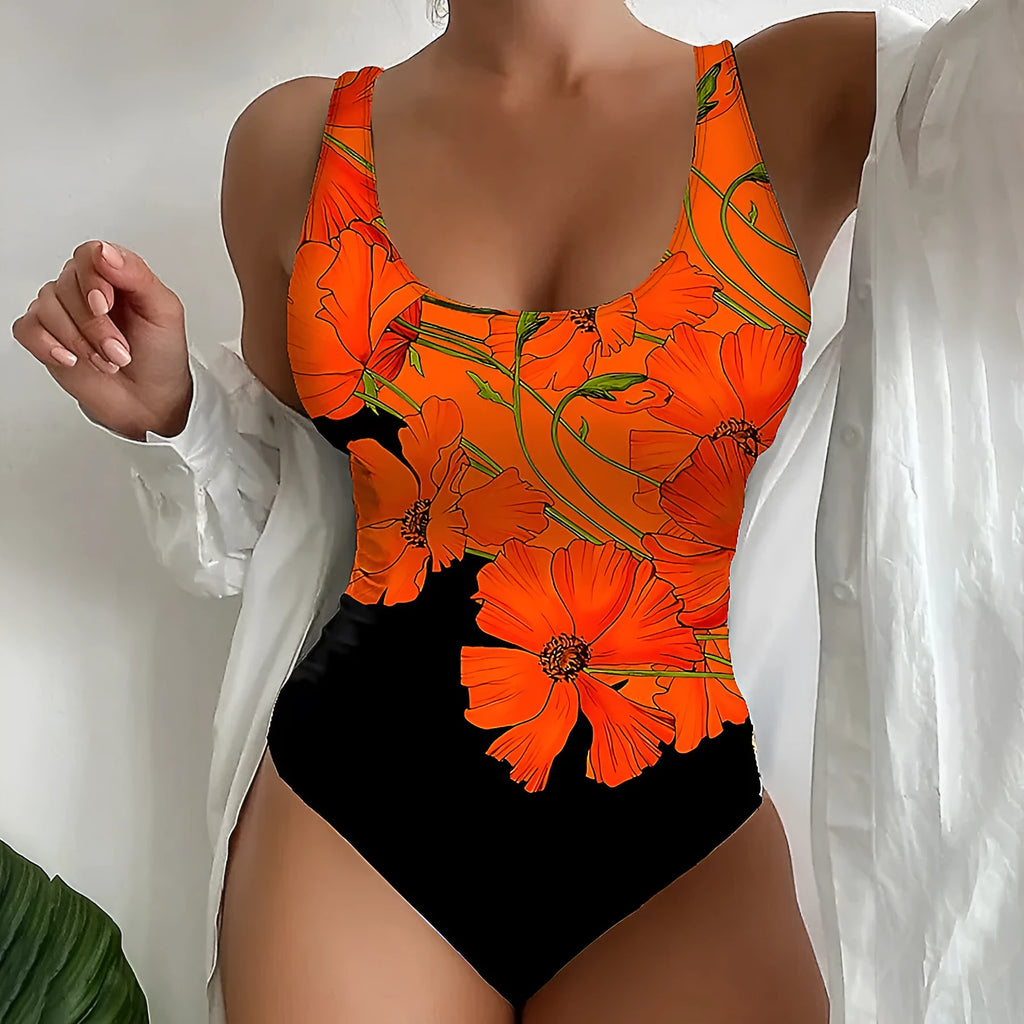 Orange floral print backless one-piece swimsuit on a model, showing slim fit design.