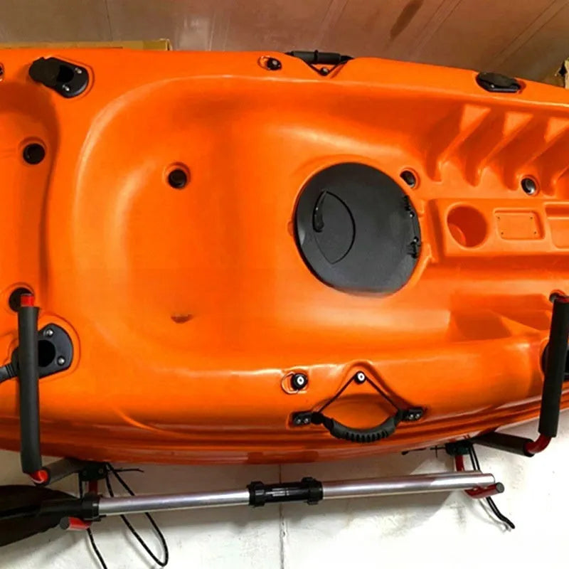 Carbon steel kayak and surfboard wall storage hanger rack mounted on a wall