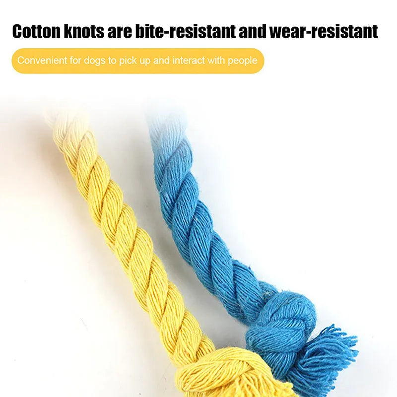 Blue and yellow cartoon elastic football dog toy made from cotton rope for tug of war and chewing.
