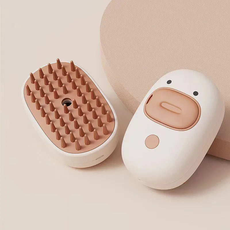 White or yellow rechargeable steam brush for grooming cats and dogs with rubber comb teeth