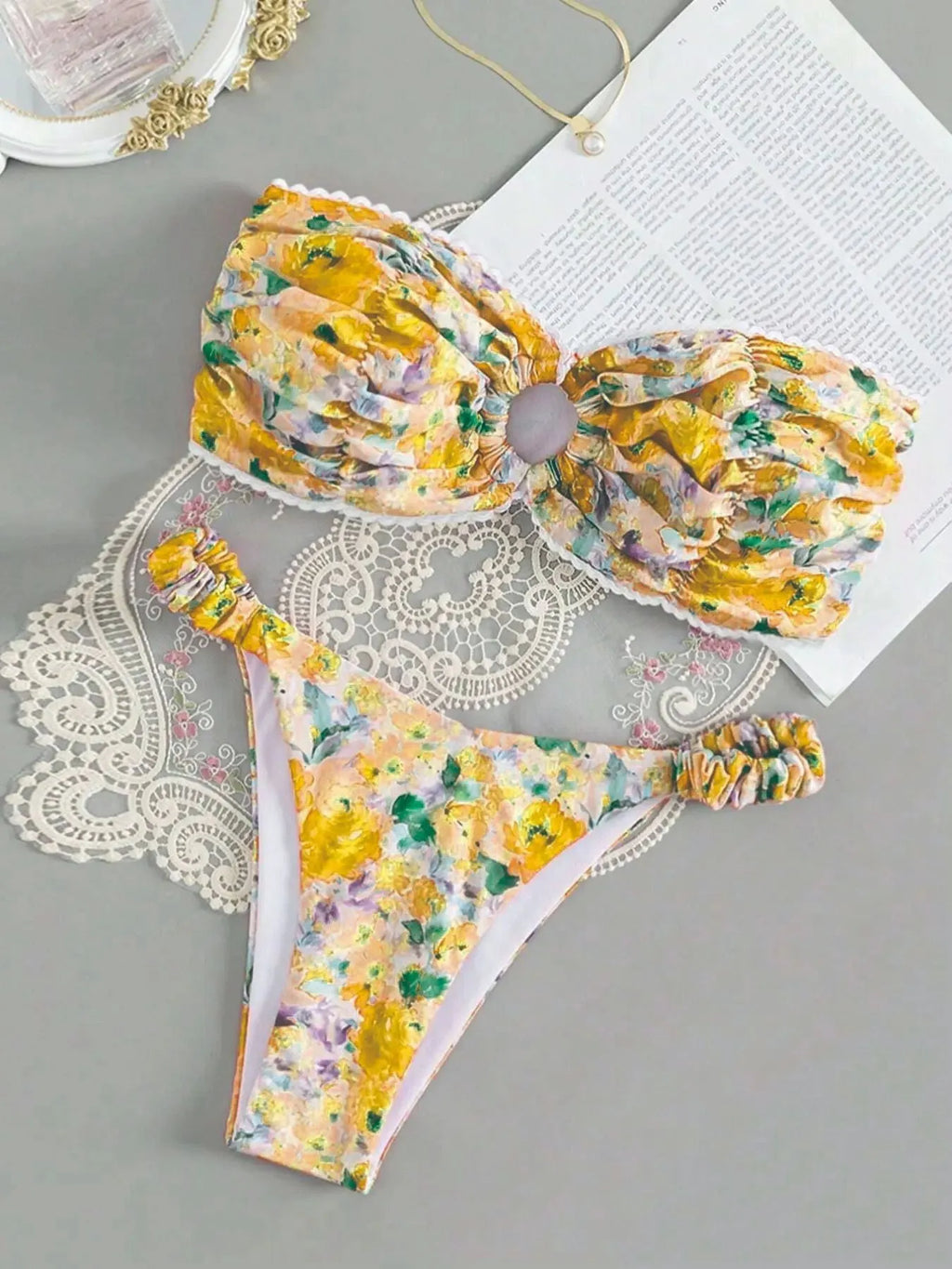 Women's floral print bikini set with lace tube top in blue, pink, yellow, or colourful options.
