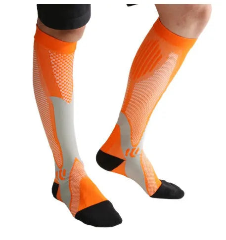 A pair of graduated compression socks for men and women in an athletic style, shown in a colour option like black or blue.