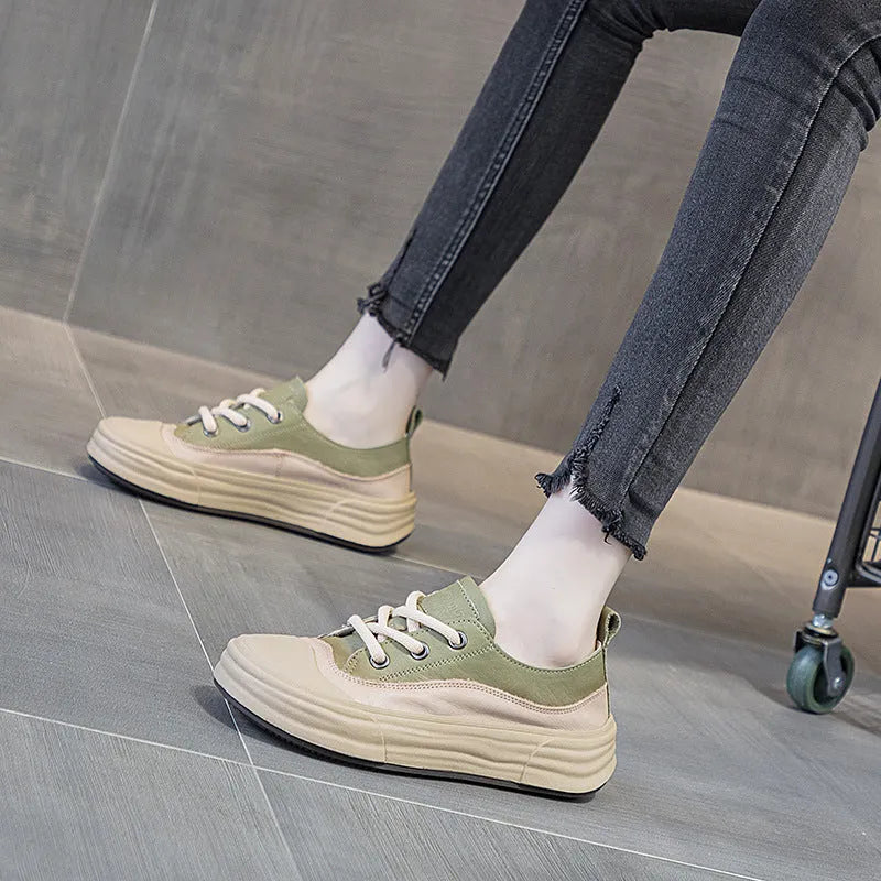 Women's matcha green leather platform sneakers with round toe and front laces on a white background.