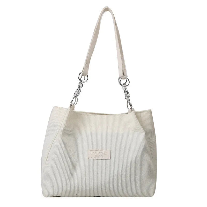 Corduroy one-shoulder tote handbag with three-dimensional pocket in street trend style