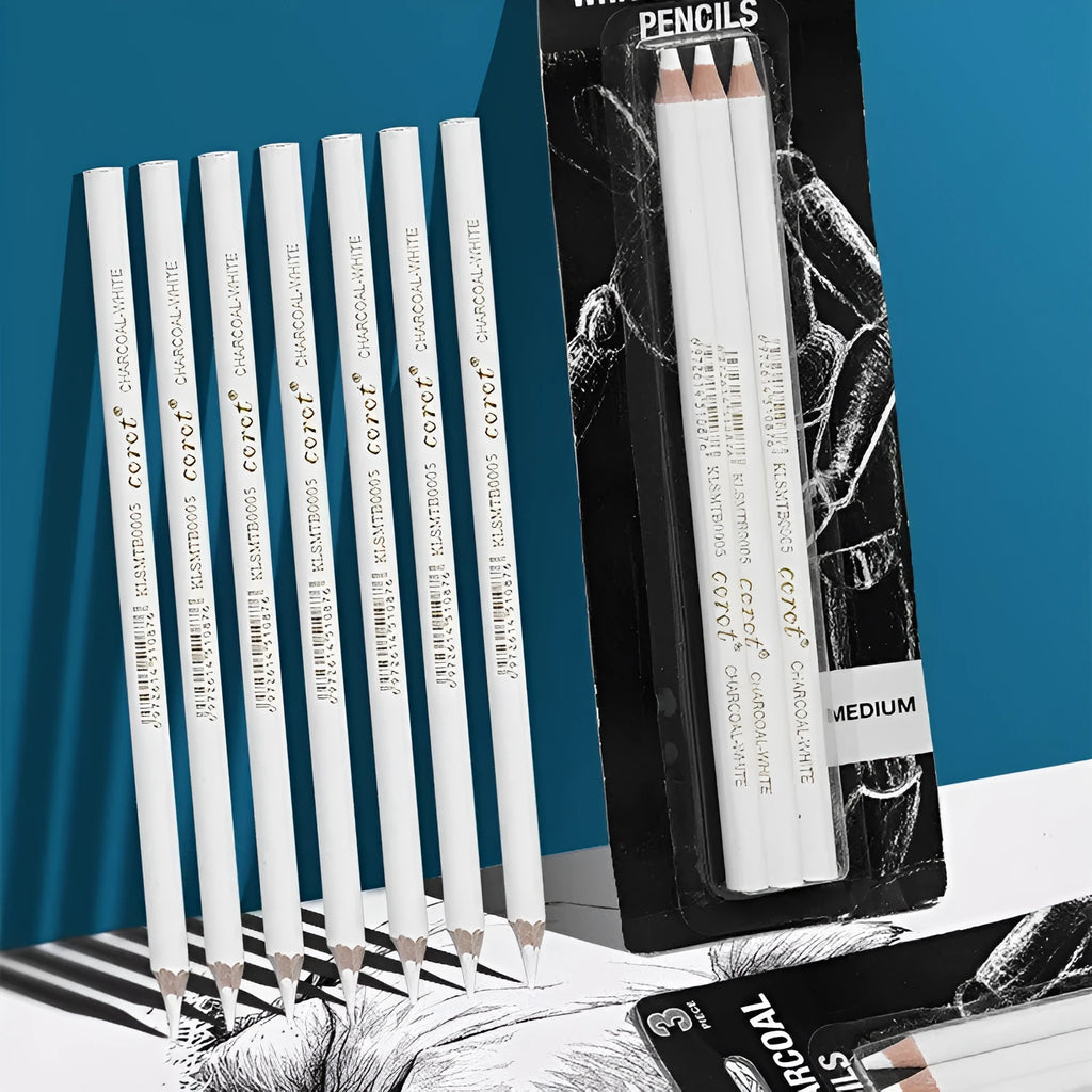 Three white charcoal drawing pencils with wooden barrels for sketching and highlighting