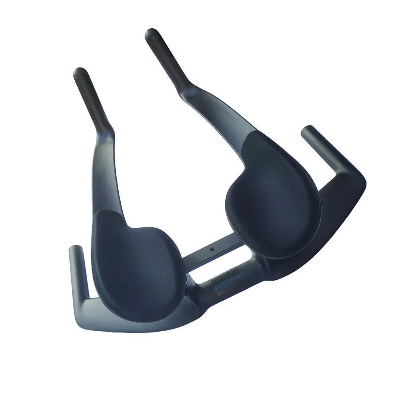 Black carbon fibre time trial bicycle handlebar showing aero extensions and central clamp area.