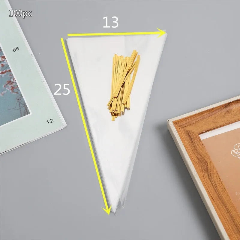 Transparent triangle-shaped plastic packaging bag with a twisted wire tie closure.