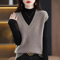 Women's creamy-white V-neck sleeveless knitted vest with a raised 3D stereoscopic pattern texture.
